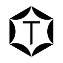 Touchstone Crystal by Swarovski logo